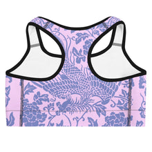 Load image into Gallery viewer, Melodia Gallery baby pink sports bra with a floral and dragon print, scoop neckline, and racerback. Made from recycled polyester and elastane.