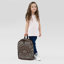 Load image into Gallery viewer, Melodia Gallery brown and white bandana print polyester backpack with padded straps and multiple pockets, worn by a child.