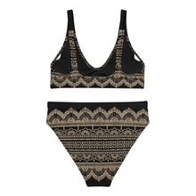 Load image into Gallery viewer, Melodia Gallery black recycled polyester high-waisted bikini with gold lace-like pattern and removable pads.