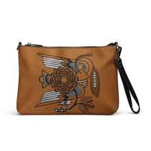 Load image into Gallery viewer, Melodia Gallery crossbody bag in cognac faux leather with a folk art bird and floral design. Includes wrist strap.