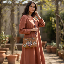 Load image into Gallery viewer, Melodia Gallery cognac faux leather crossbody bag with vintage Minhwa tiger, swallows, and floral art design.