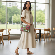 Load image into Gallery viewer, Melodia Gallery Passionflower Art Nouveau Crossbody Bag in faux leather with pink floral print and dark gray hardware.