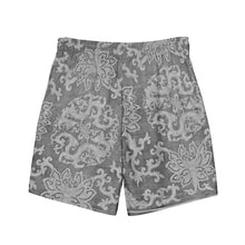 Load image into Gallery viewer, Melodia Gallery Men's Dragon Lotus recycled polyester swim trunks with elastic waistband and mesh pockets.