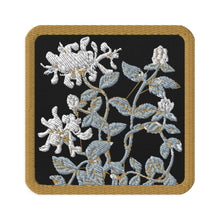 Load image into Gallery viewer, Melodia Gallery Honeysuckle embroidered tactical patch with Art Nouveau floral design on black fabric with gold border.