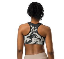 Load image into Gallery viewer, Melodia Gallery Marble Wash Sports Bra in black and white, made from recycled polyester and elastane with a racerback design.