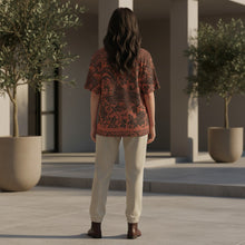 Load image into Gallery viewer, Melodia Gallery oversized cotton t-shirt with a phoenix and floral print in rust and dark grey. Unisex sizing.