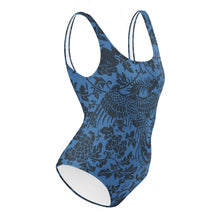 Load image into Gallery viewer, Melodia Gallery blue one-piece swimsuit with a black phoenix and floral print. Made from recycled materials.