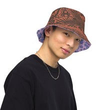 Load image into Gallery viewer, Melodia Gallery reversible bucket hat with intricate phoenix and floral pattern on one side, and lavender and blue hues on the other.