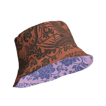 Load image into Gallery viewer, Melodia Gallery reversible bucket hat with phoenix and floral pattern in earth tones and lavender blue.