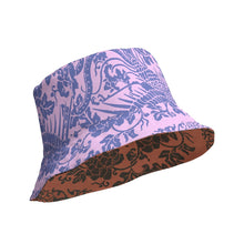 Load image into Gallery viewer, Melodia Gallery reversible bucket hat with a pink and blue phoenix and floral pattern on one side and a brown and black floral pattern on the other.