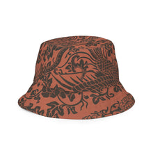 Load image into Gallery viewer, Melodia Gallery Phoenix + Flora reversible bucket hat in rust with black intricate pattern. One side features phoenix and floral motifs.