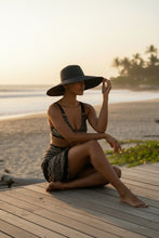 Load image into Gallery viewer, Melodia Gallery Shakti Lace Recycled High-waisted Bikini with black and white pattern, featuring removable pads and zig-zag stitching.