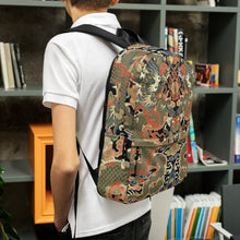Load image into Gallery viewer, Melodia Gallery Twin Dragons backpack featuring 18th century Qing Dynasty kesi silk tapestry design with dragons and clouds in vermillion, jade, and gold.