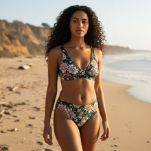 Load image into Gallery viewer, Melodia Gallery vintage lotus flower high-waisted bikini set with recycled fabric. Features a black background with a floral print.