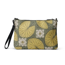 Load image into Gallery viewer, Melodia Gallery Water Lilies Art Nouveau crossbody bag in faux leather with yellow lily pads and white flowers on a dark green background.