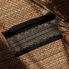 Load image into Gallery viewer, Melodia Gallery black bandeau bikini top with intricate beige lace-inspired print, recycled polyester blend, UPF 50+
