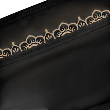Load image into Gallery viewer, Melodia Gallery black recycled polyester bandeau bikini top with lace flower detail. Soft, snug, UPF 50+.
