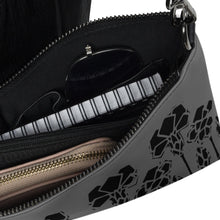 Load image into Gallery viewer, Melodia Gallery Art Nouveau irises crossbody bag in cool grey faux leather with black stencil art. Interior has zip pockets and organizer.
