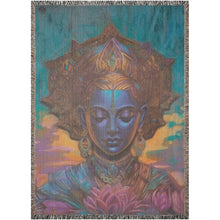 Load image into Gallery viewer, Melodia Gallery The Art of Stillness 100% cotton woven blanket with fringed edges, featuring a blue-faced figure with eyes closed, adorned with ornate jewelry and a lotus flower.
