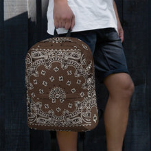 Load image into Gallery viewer, Melodia Gallery brown and white bandana print polyester backpack with laptop compartment and multiple pockets.
