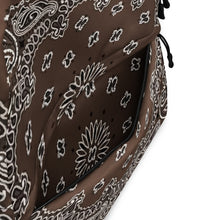 Load image into Gallery viewer, Melodia Gallery brown and white bandana print polyester backpack with zip pocket and adjustable straps.
