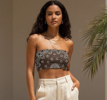 Load image into Gallery viewer, Melodia Gallery brown recycled polyester bandeau bikini top with white paisley print. Strapless, double-layered, UPF 50+.
