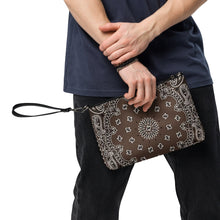 Load image into Gallery viewer, Melodia Gallery chocolate brown faux leather crossbody bag with white paisley bandana print and wrist strap.
