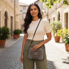 Load image into Gallery viewer, Melodia Gallery brown and white bandana print crossbody bag with faux leather exterior and dark gray hardware.

