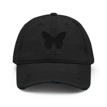 Load image into Gallery viewer, Melodia Gallery black distressed cotton dad hat with embroidered butterfly detail. Adjustable strap, fits most.
