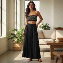 Load image into Gallery viewer, Melodia Gallery black bandeau bikini top with gold lace flower detail, made from recycled polyester and elastane.
