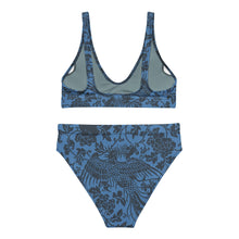 Load image into Gallery viewer, Melodia Gallery blue recycled high-waisted bikini set with a dark grey phoenix and floral print.

