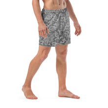 Load image into Gallery viewer, Melodia Gallery Men's Dragon Lotus recycled polyester swim trunks with elastic waistband and mesh pockets.
