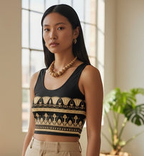 Load image into Gallery viewer, Melodia Gallery black cotton crop top with gold Egyptian lotus pattern. Boho style, perfect for yoga or festivals.
