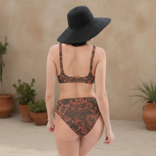 Load image into Gallery viewer, Melodia Gallery high-waisted bikini set with a floral and phoenix print in brown and black. Made from recycled materials.
