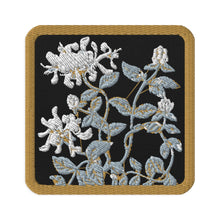Load image into Gallery viewer, Melodia Gallery black embroidered patch with white honeysuckle flowers and grey-blue leaves in Art Nouveau style.
