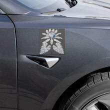 Load image into Gallery viewer, Melodia Gallery vintage lotus bloom art car magnet with blue and white floral design on a dark grey car.
