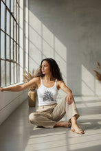 Load image into Gallery viewer, Melodia Gallery white 100% cotton micro rib crop tank with vintage lotus bloom graphic art.
