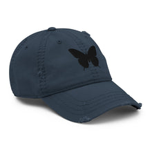 Load image into Gallery viewer, Melodia Gallery navy blue distressed cotton dad hat with black butterfly embroidery. Adjustable strap, fits most sizes.
