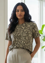 Load image into Gallery viewer, Melodia Gallery oversized cotton t-shirt with vintage floral print in black and cream. Short sleeves, crew neck.
