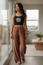 Load image into Gallery viewer, Melodia Gallery black 100% cotton micro-rib tank top with vintage peace lily graphic art.
