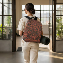Load image into Gallery viewer, Melodia Gallery Phoenix + Floral Minimalist Backpack in rust orange with black phoenix and floral print. Features laptop pocket.
