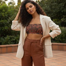 Load image into Gallery viewer, Melodia Gallery Phoenix + Floral Recycled Bandeau Bikini Top. Terracotta with black phoenix and floral print. Recycled polyester and elastane.
