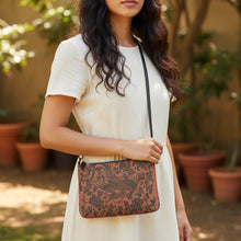 Load image into Gallery viewer, Melodia Gallery faux leather crossbody bag with a vintage Qing Dynasty phoenix and floral print in black on a rust background.
