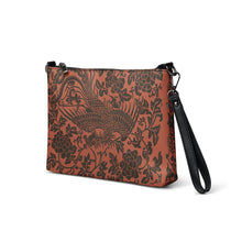 Load image into Gallery viewer, Melodia Gallery faux leather crossbody bag with a vintage phoenix and floral pattern in dark brown on a rust background.

