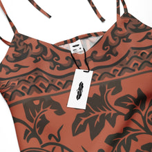 Load image into Gallery viewer, Melodia Gallery Phoenix + Floral Tie-Strap Midi Dress in rust with dark brown pattern. Features adjustable tie straps, V-neck, and side slit.
