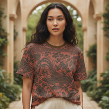 Load image into Gallery viewer, Melodia Gallery oversized cotton t-shirt with a phoenix and floral print in rust and dark grey.
