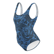 Load image into Gallery viewer, Melodia Gallery blue one-piece swimsuit with a dark blue phoenix and floral pattern. Made from recycled materials.
