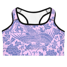 Load image into Gallery viewer, Melodia Gallery baby pink sports bra with a blue floral and phoenix print. Moisture-wicking, four-way stretch fabric.

