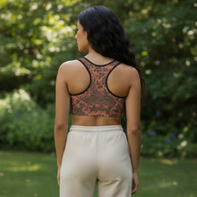 Load image into Gallery viewer, Melodia Gallery Phoenix + Floral recycled polyester sports bra with scoop neckline and racerback silhouette in terracotta.
