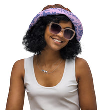 Load image into Gallery viewer, Melodia Gallery reversible bucket hat with intricate phoenix and floral pattern on one side and lavender/blue hues on the other.
